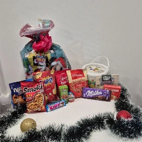 Novogodišnji slatki paketić za decu od 2499 din 2025, 1-3g