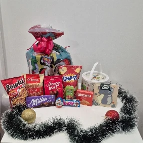 Novogodišnji slatki paketić za decu od 2499 din 2025, 1-3g